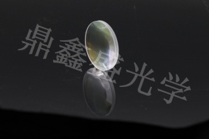 Laser focusing lens
